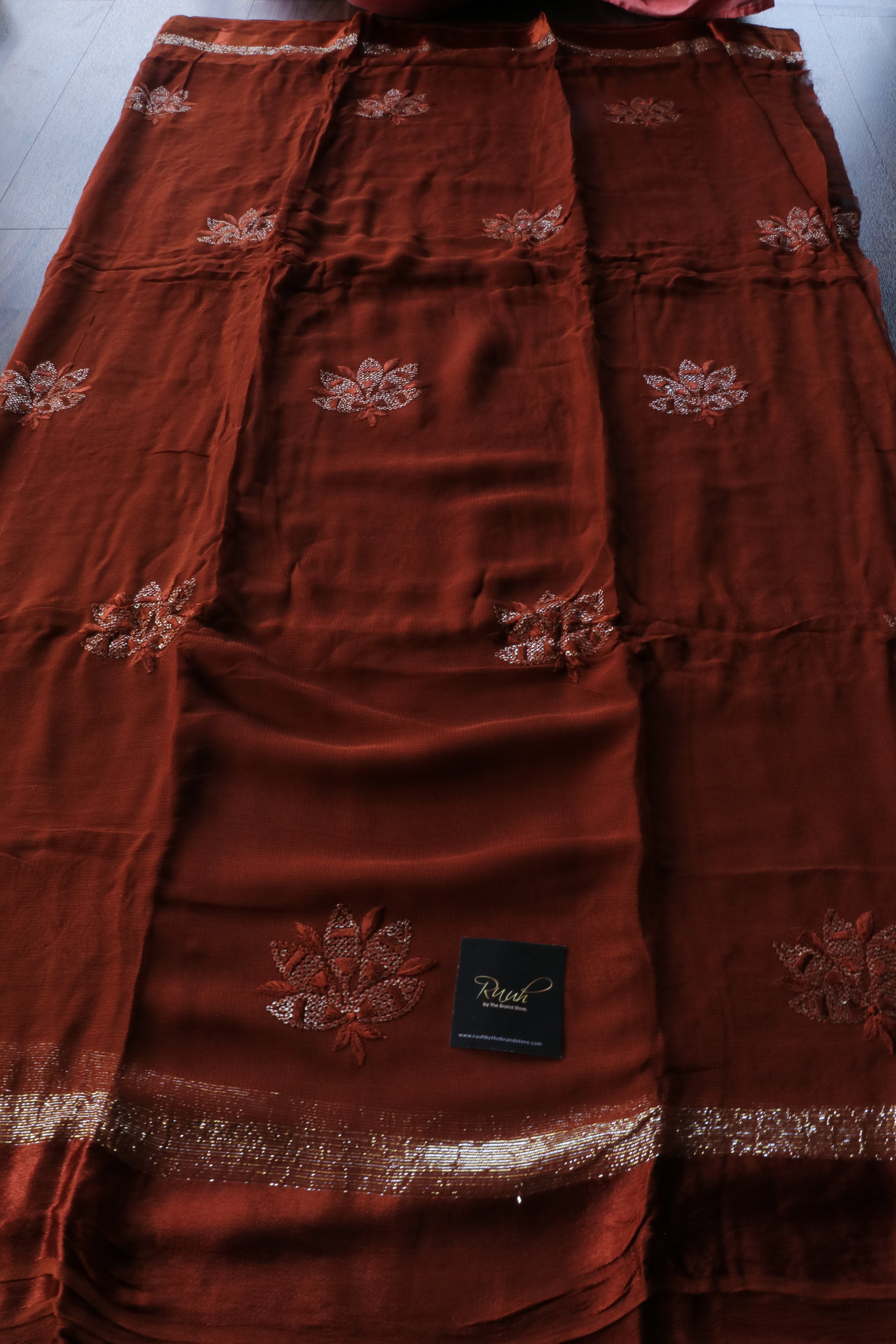 DARK BROWN VISCOSE GEORGETTE SAREE WITH LOTUS EMBROIDERY