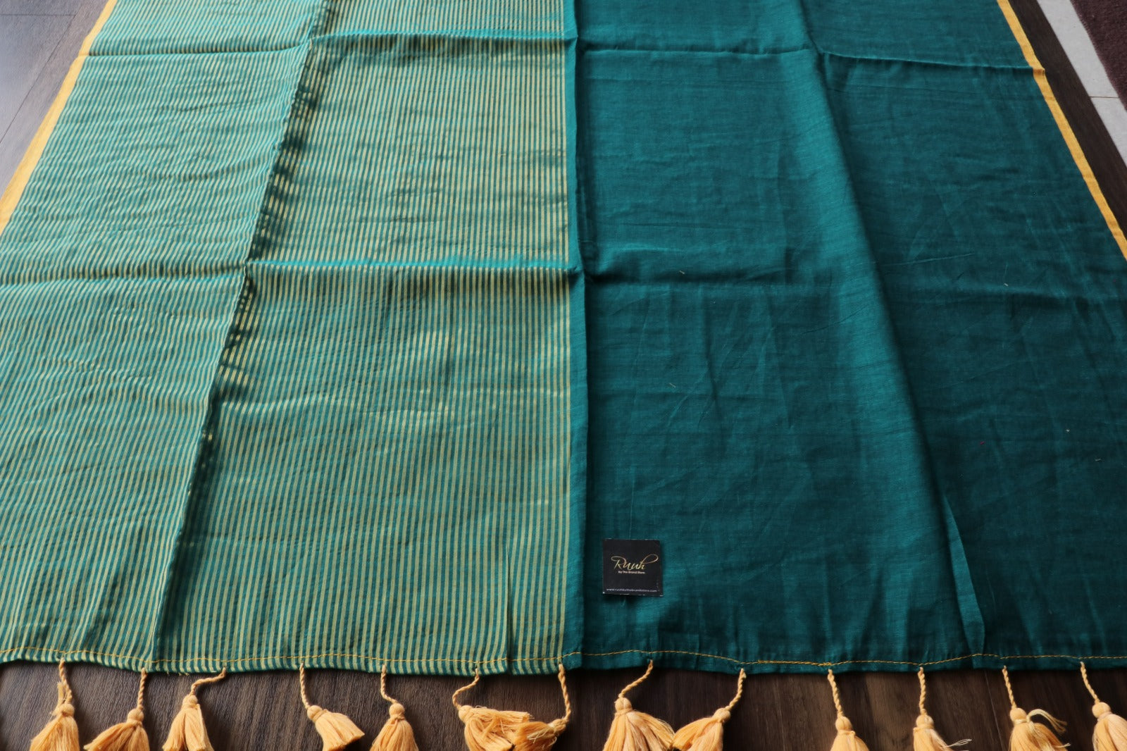 PEACOCK GREEN MULMUL DESIGNER SAREE