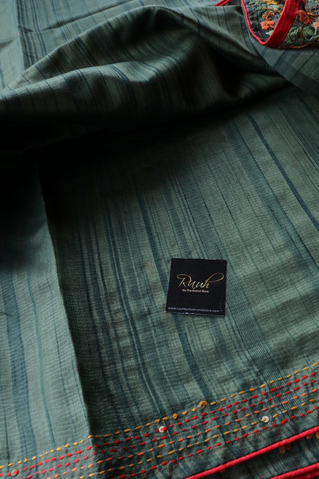 GREEN SEMI TUSSAR WITH HANDWORK