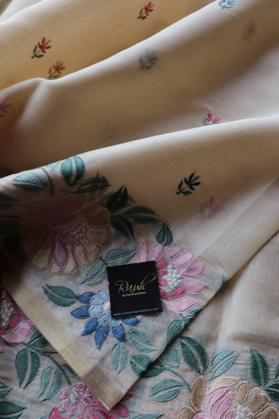 OFF WHITE SEMI TUSSAR WITH FLORAL EMBRODIERY