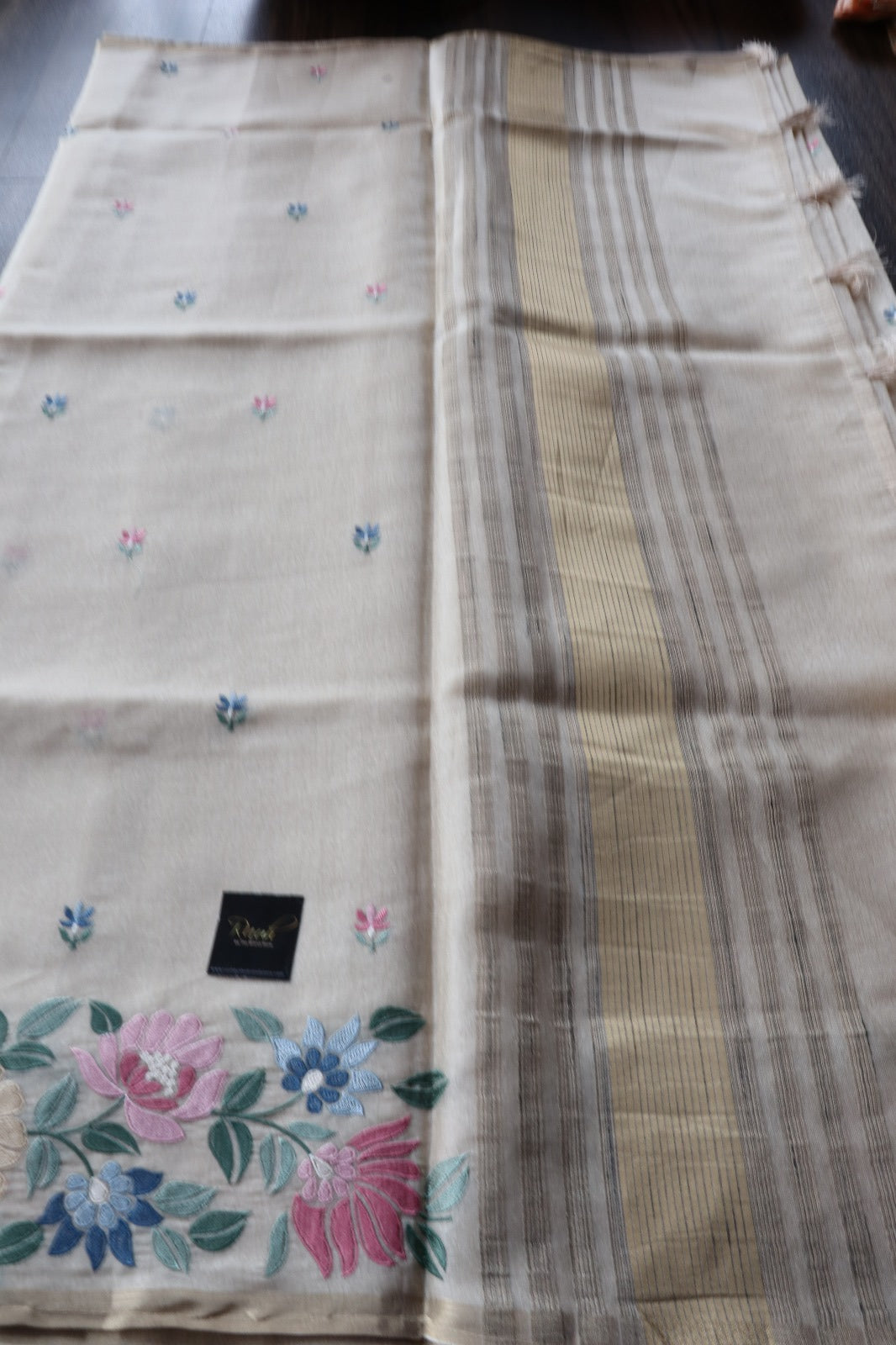 OFF WHITE SEMI TUSSAR WITH FLORAL EMBRODIERY
