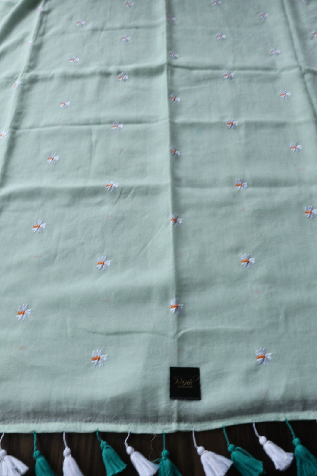 LIGHT PISTA GREEN MULMUL PARIJAT EMBOIDERY