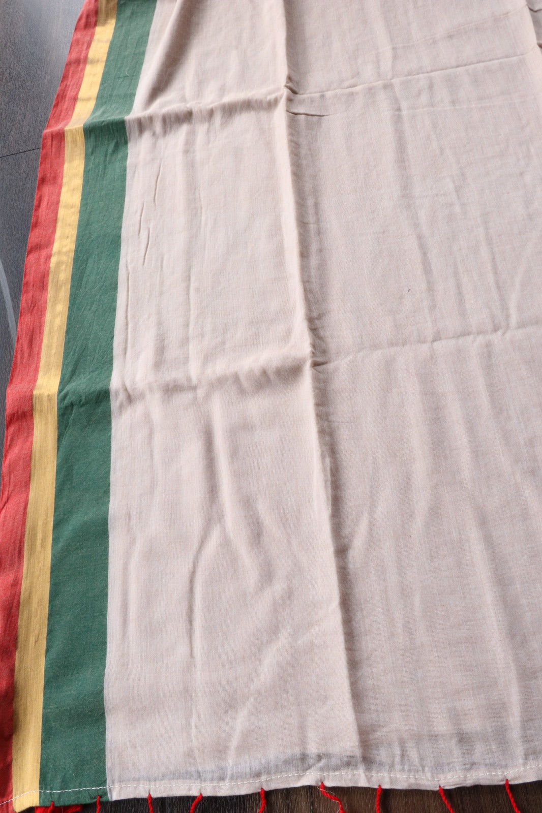 BEIGE MULMUL SAREE WITH TRI COLOUR EDGING