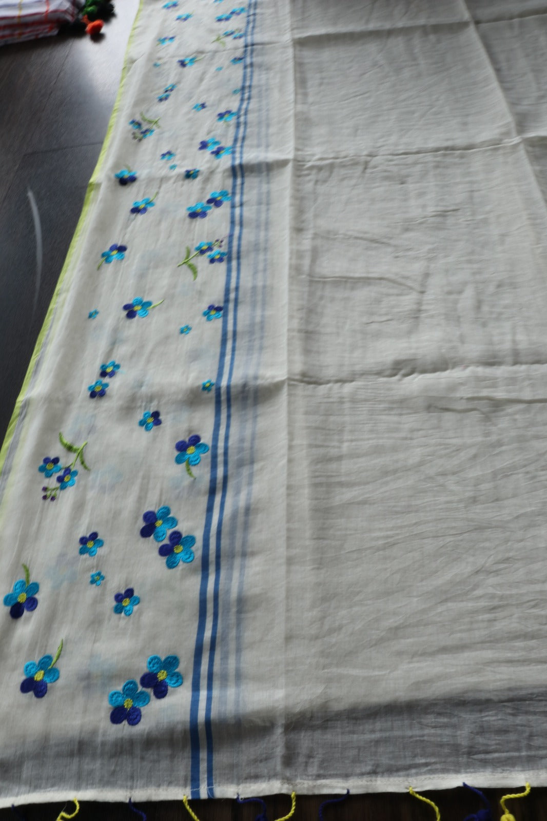 MULTICOLOUR FLORAL EMBROIDERED MULMUL SAREE