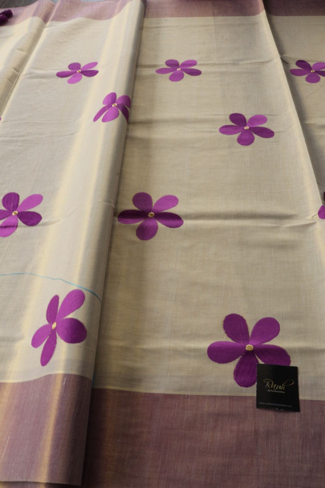 PURPLE FLORAL EMBROIDERY ON KERALA TISSUE SAREE