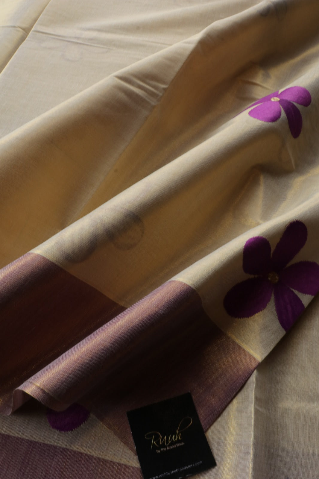 PURPLE FLORAL EMBROIDERY ON KERALA TISSUE SAREE