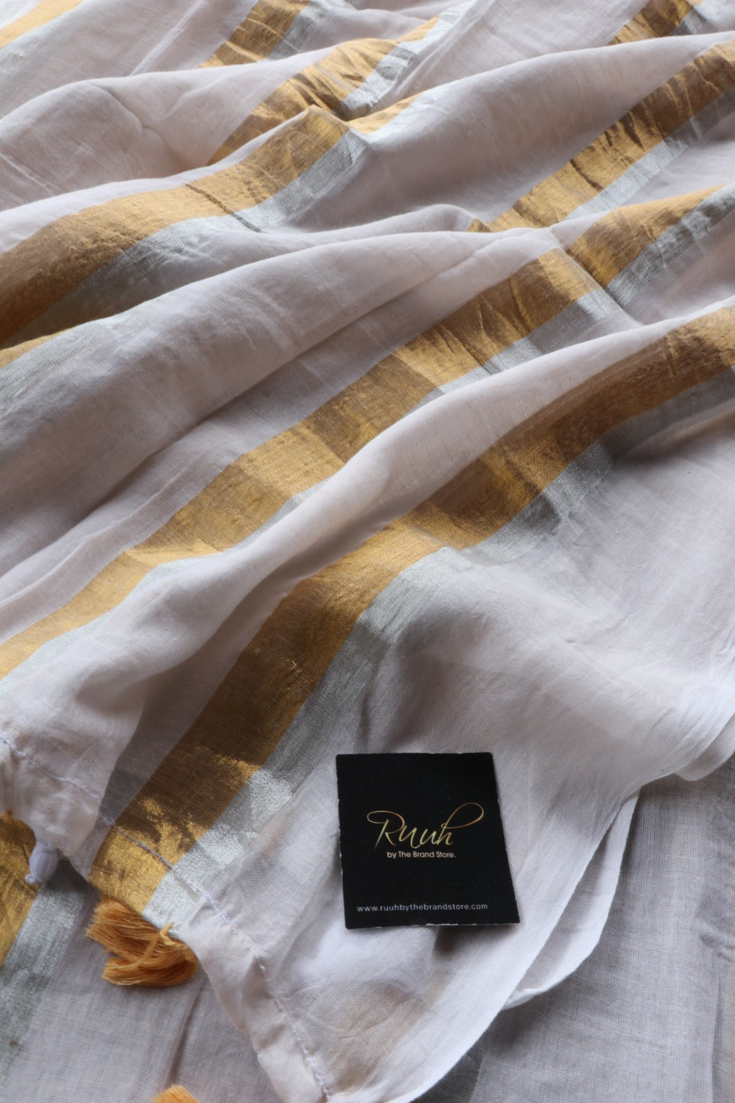 CREAM MULMUL SAREE WITH ZARI STRIPES
