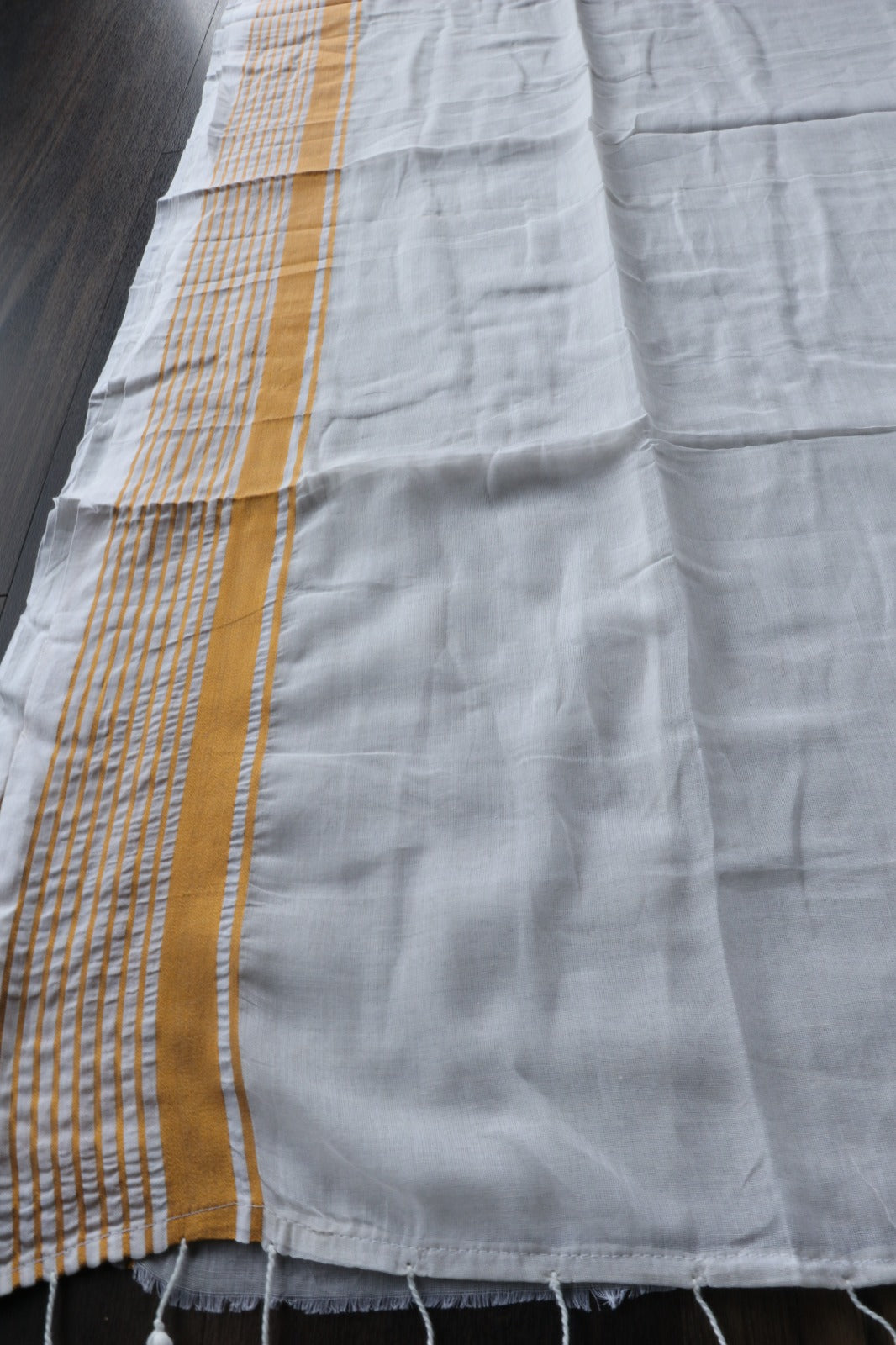OFF WHITE MULMUL COTTON SAREE WITH ZARI STRIPE BORDER