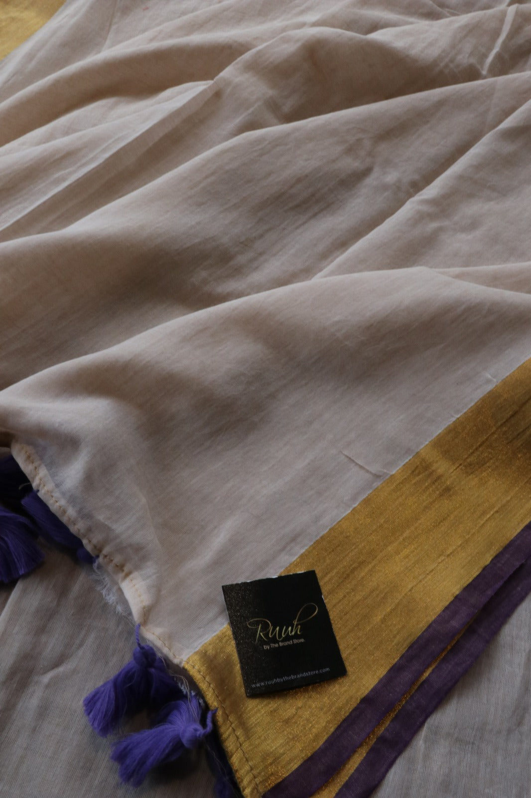 MULMUL SAREE WITH ZARI BORDER AND PURPLE EDGING