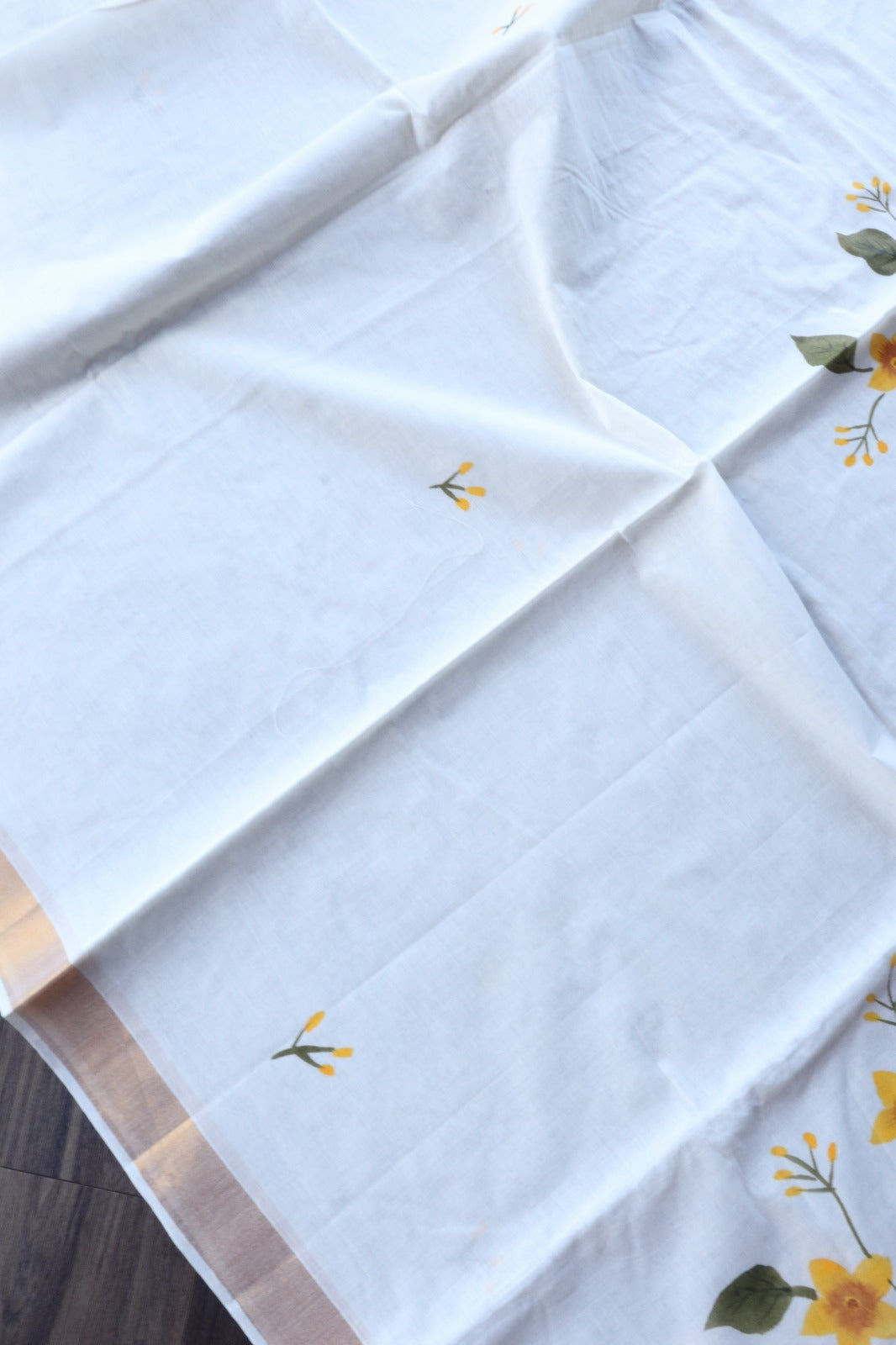 SMALL FLORAL HANDPAINT ON KERALA COTTON SAREE