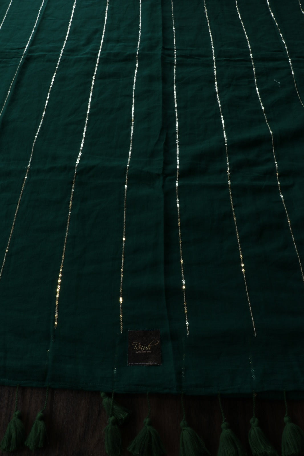 DARK GREEN MULMUL SEQUENCE SAREE