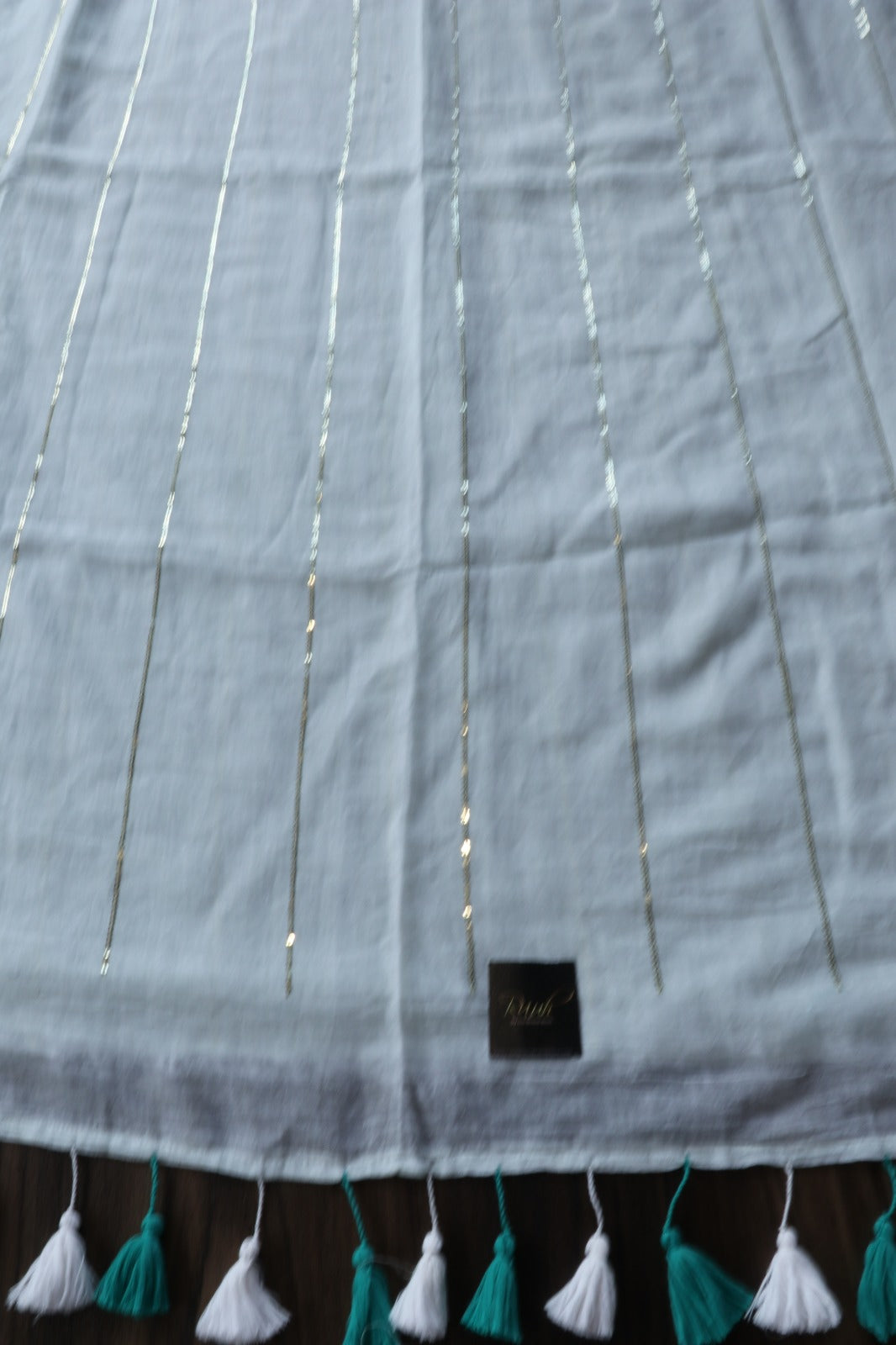 LIGHT PISTA MULMUL SEQUENCE SAREE