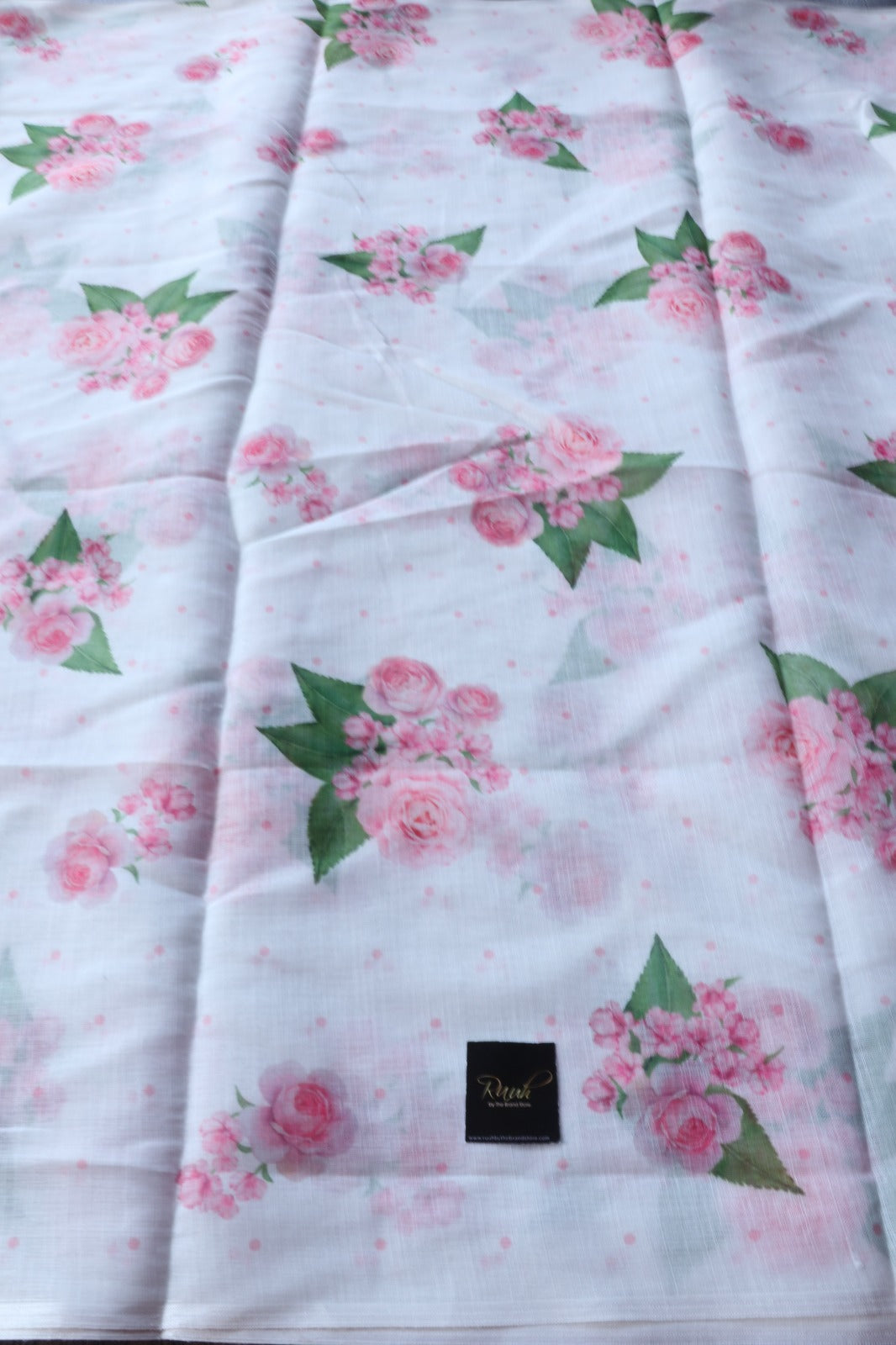 WHITE SEMI LINEN SAREE WITH FLORAL PRINTS