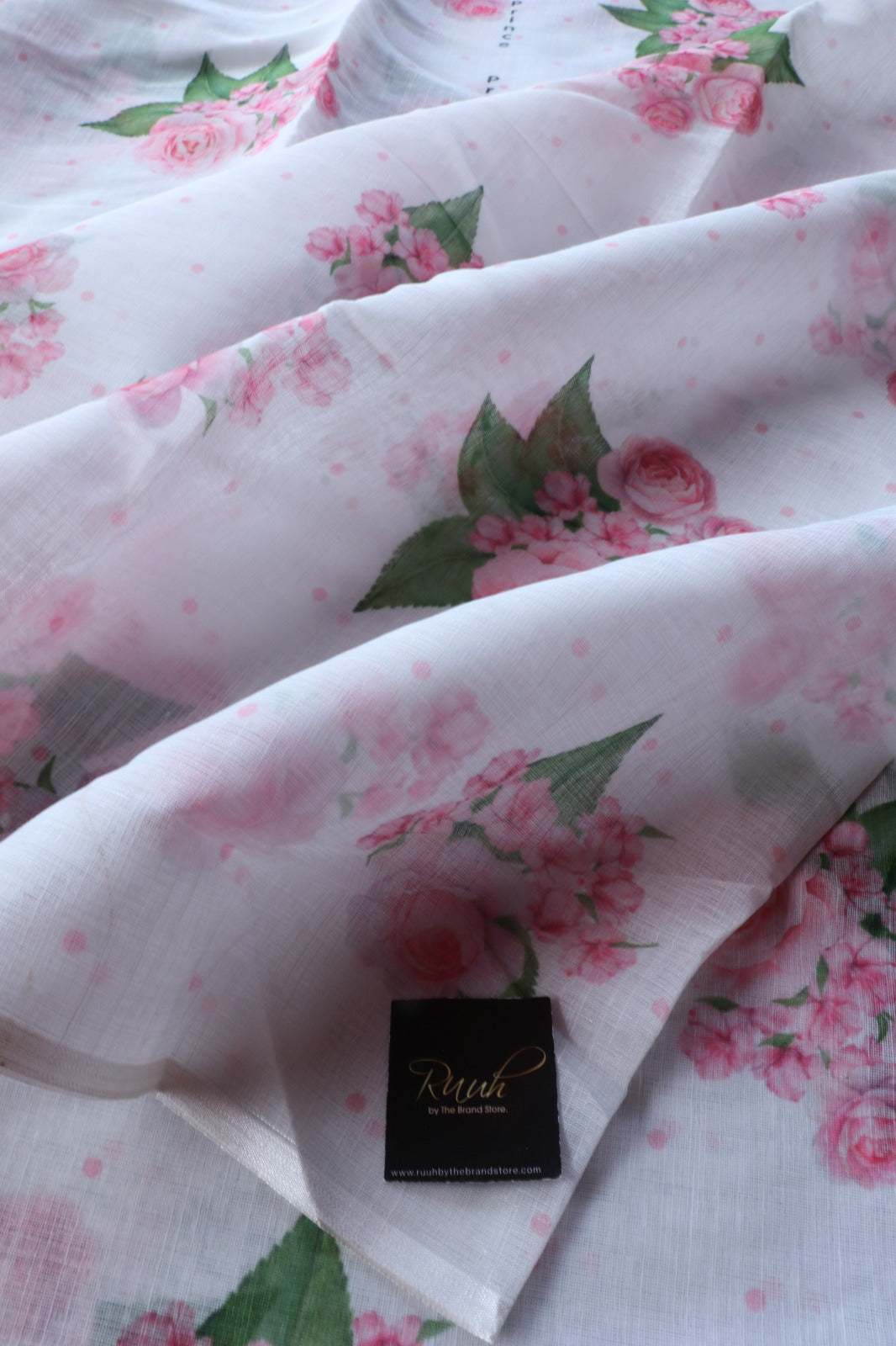 WHITE SEMI LINEN SAREE WITH FLORAL PRINTS