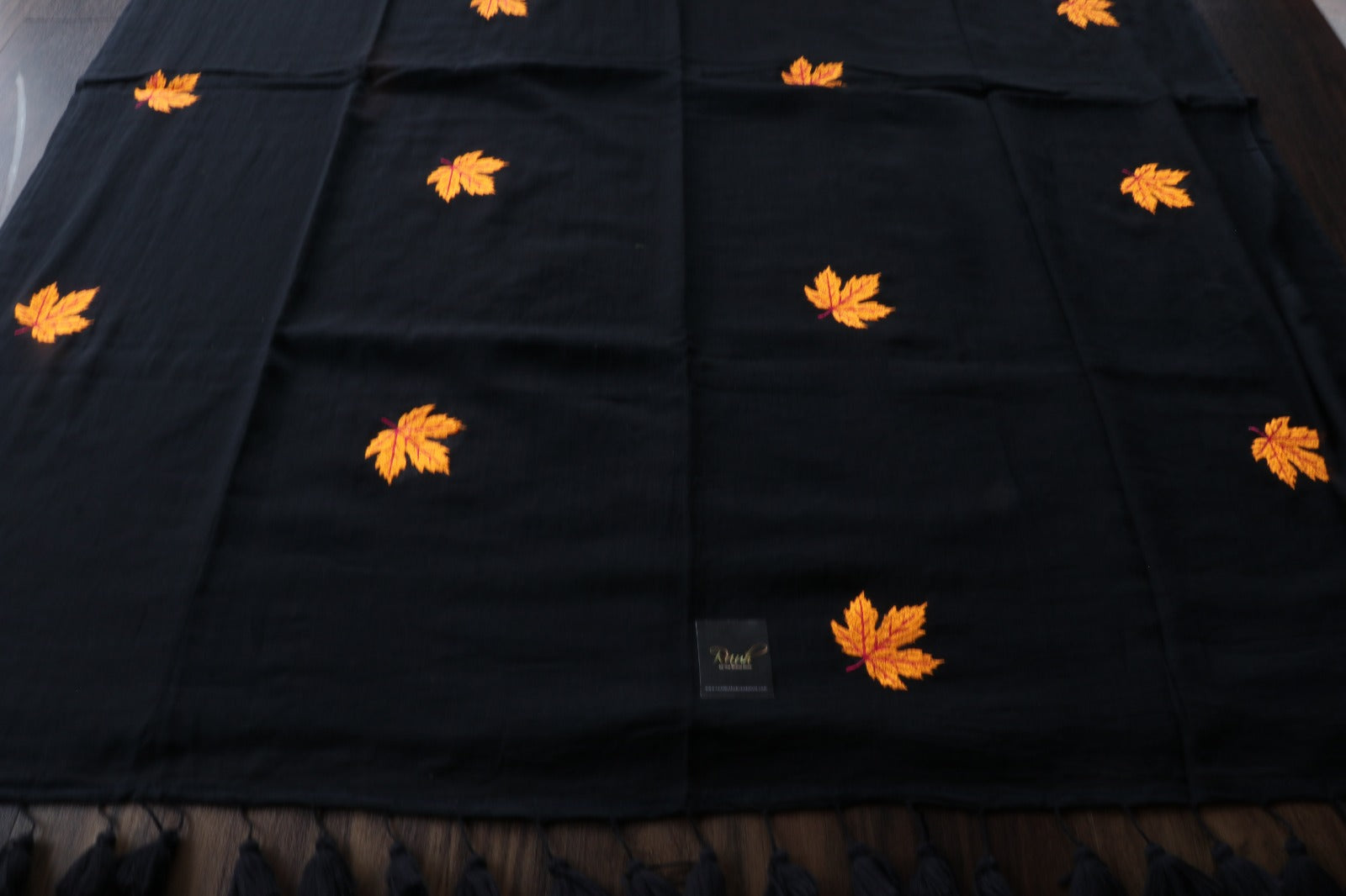BLACK MULMUL SAREE WITH MAPLE LEAF EMBROIDERY