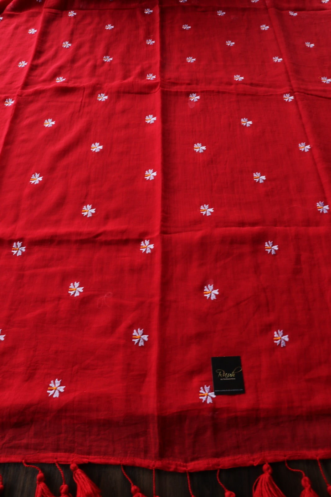 RED MULMUL SAREE WITH PARIJAT EMBROIDERY