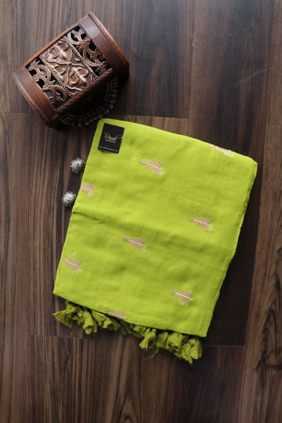 GREEN MULMUL SAREE WITH PINE TREE EMBROIDERY