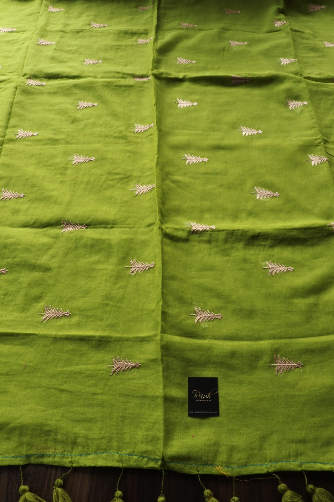 GREEN MULMUL SAREE WITH PINE TREE EMBROIDERY