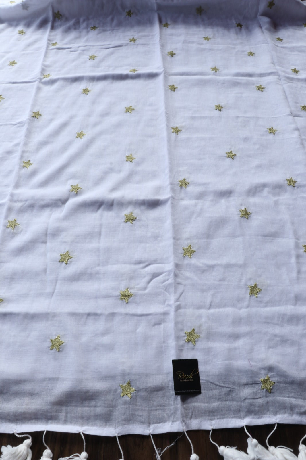 WHITE MULMUL SAREE WITH STAR EMBROIDERY