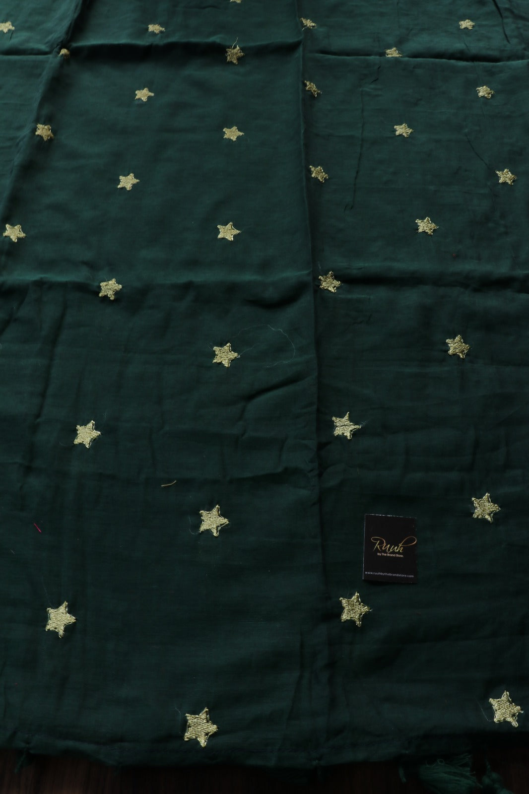 GREEN MULMUL SAREE WITH STAR EMBROIDERY