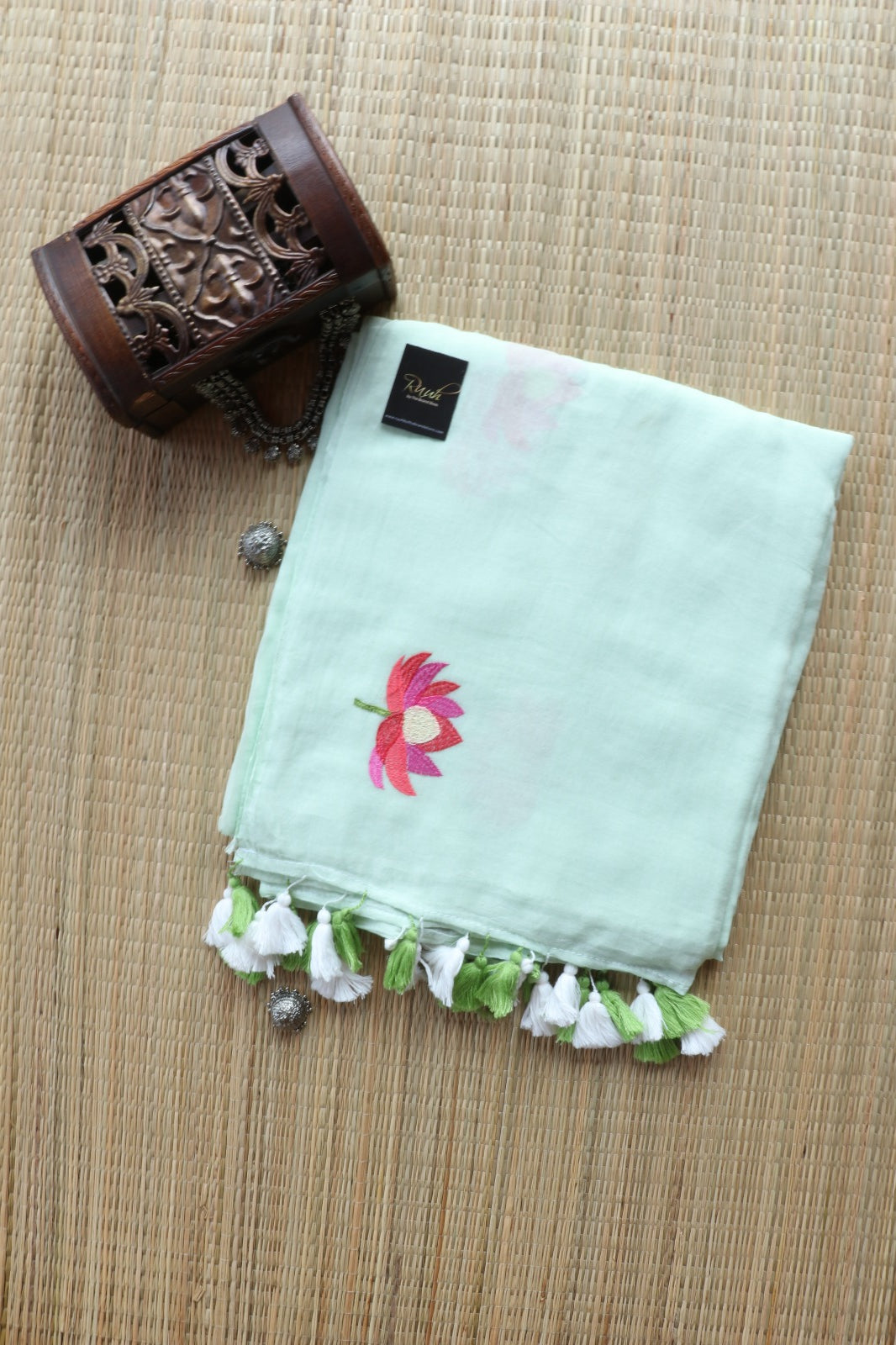 LIGHT PISTA MULMUL SAREE WITH LOTUS EMBROIDERY