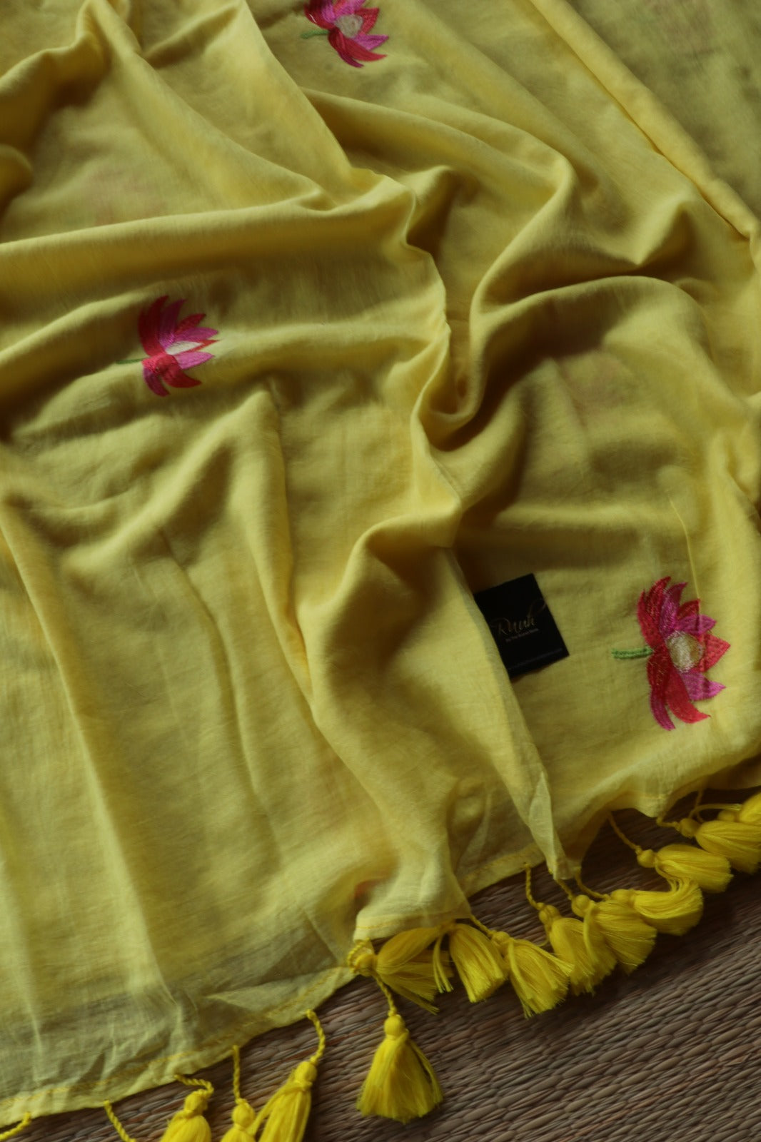 YELLOW MULMUL SAREE WITH LOTUS EMBROIDERY