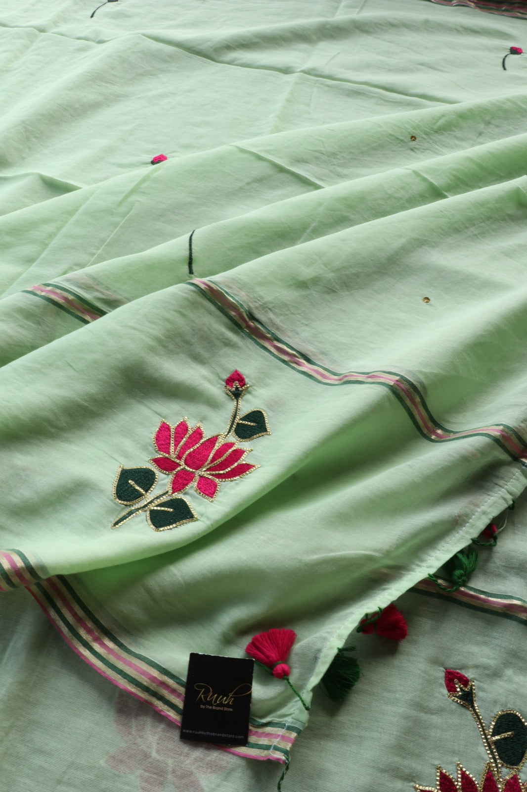 PISTA MULMUL SAREE WITH LOTUS EMBROIDERY