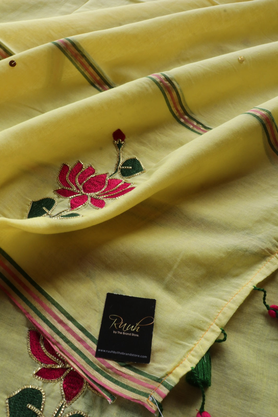 YELLOW MULMUL SAREE WITH LOTUS EMBROIDERY