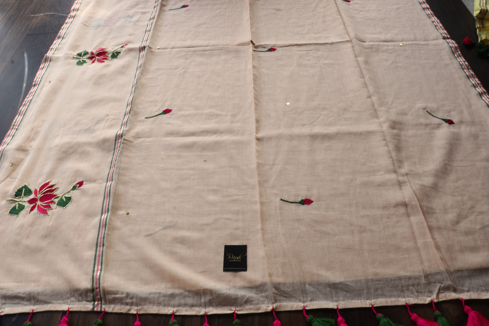 LIGHT BISCUIT MULMUL SAREE WITH LOTUS EMBROIDERY