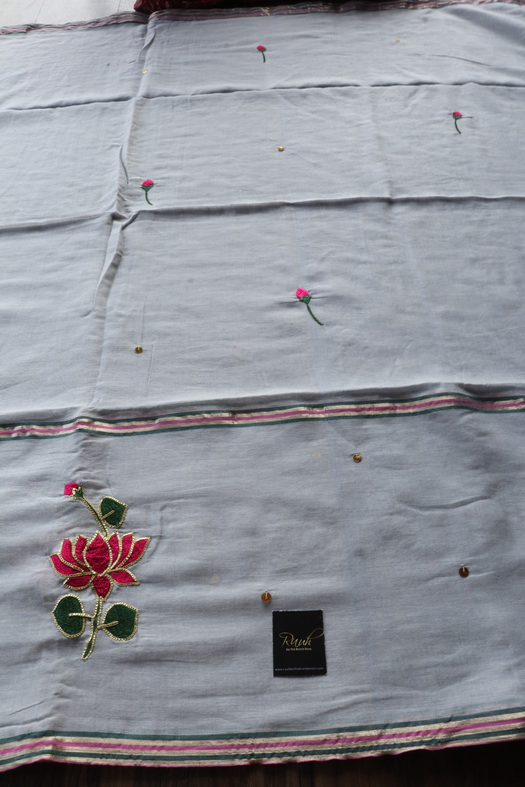 GREY MULMUL SAREE WITH LOTUS EMBROIDERY