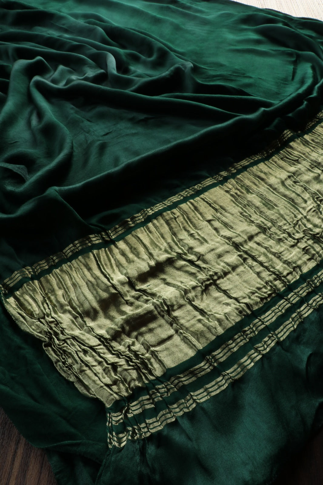 BOTTLE GREEN PLAIN MODAL SILK SAREE