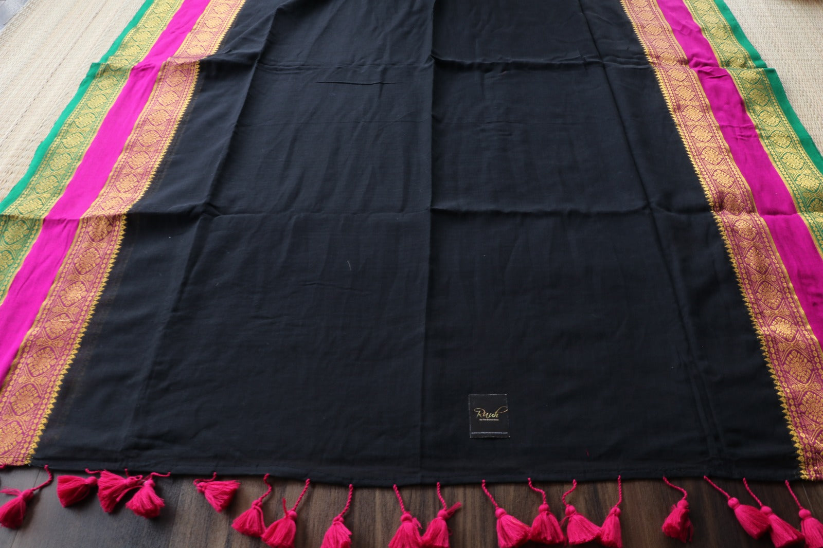 BLACK MULMUL SAREE WITH MULTICOLOUR BORDER
