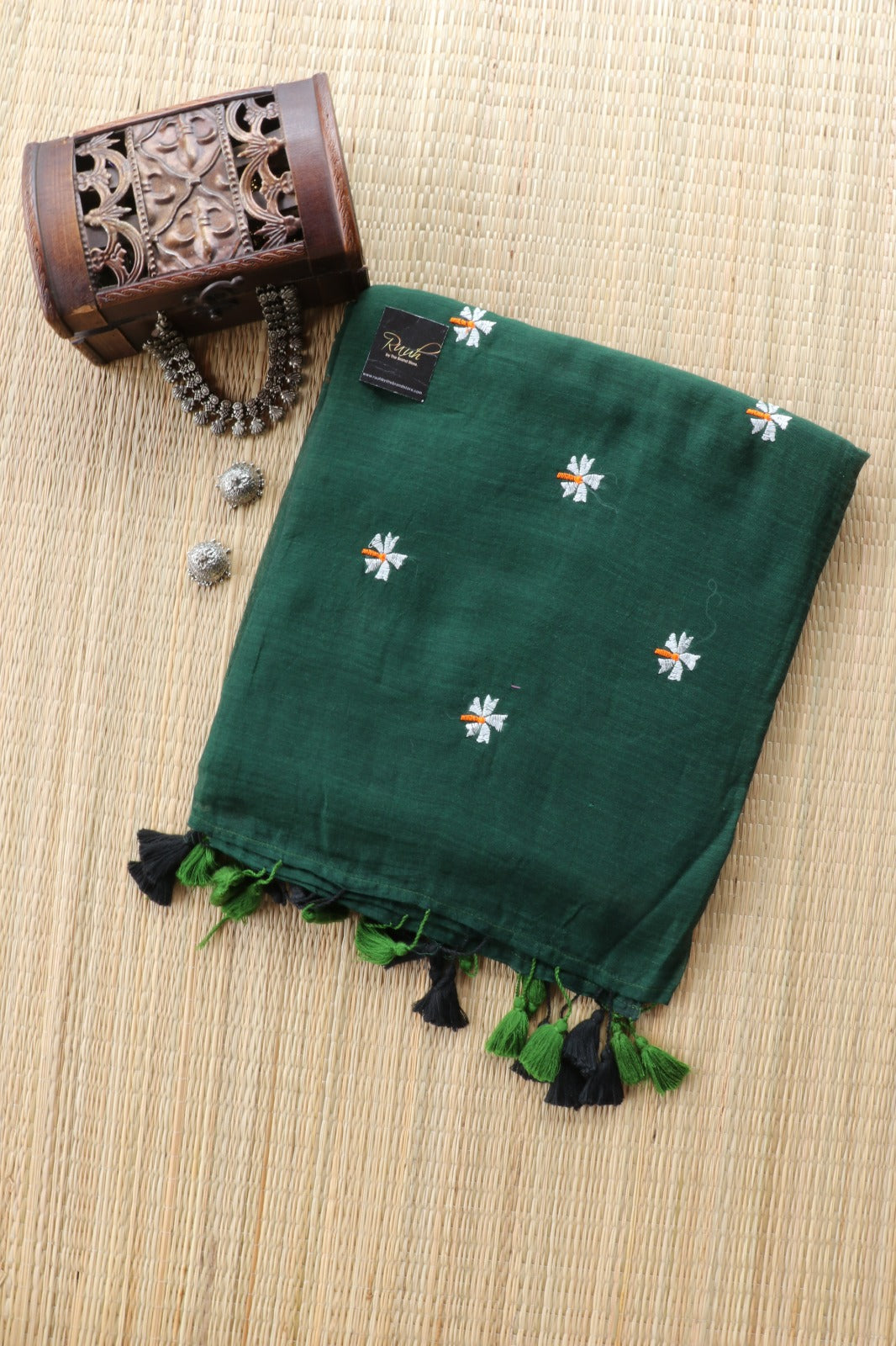 GREEN MULMUL SAREE WITH PARIJAT EMBROIDERY