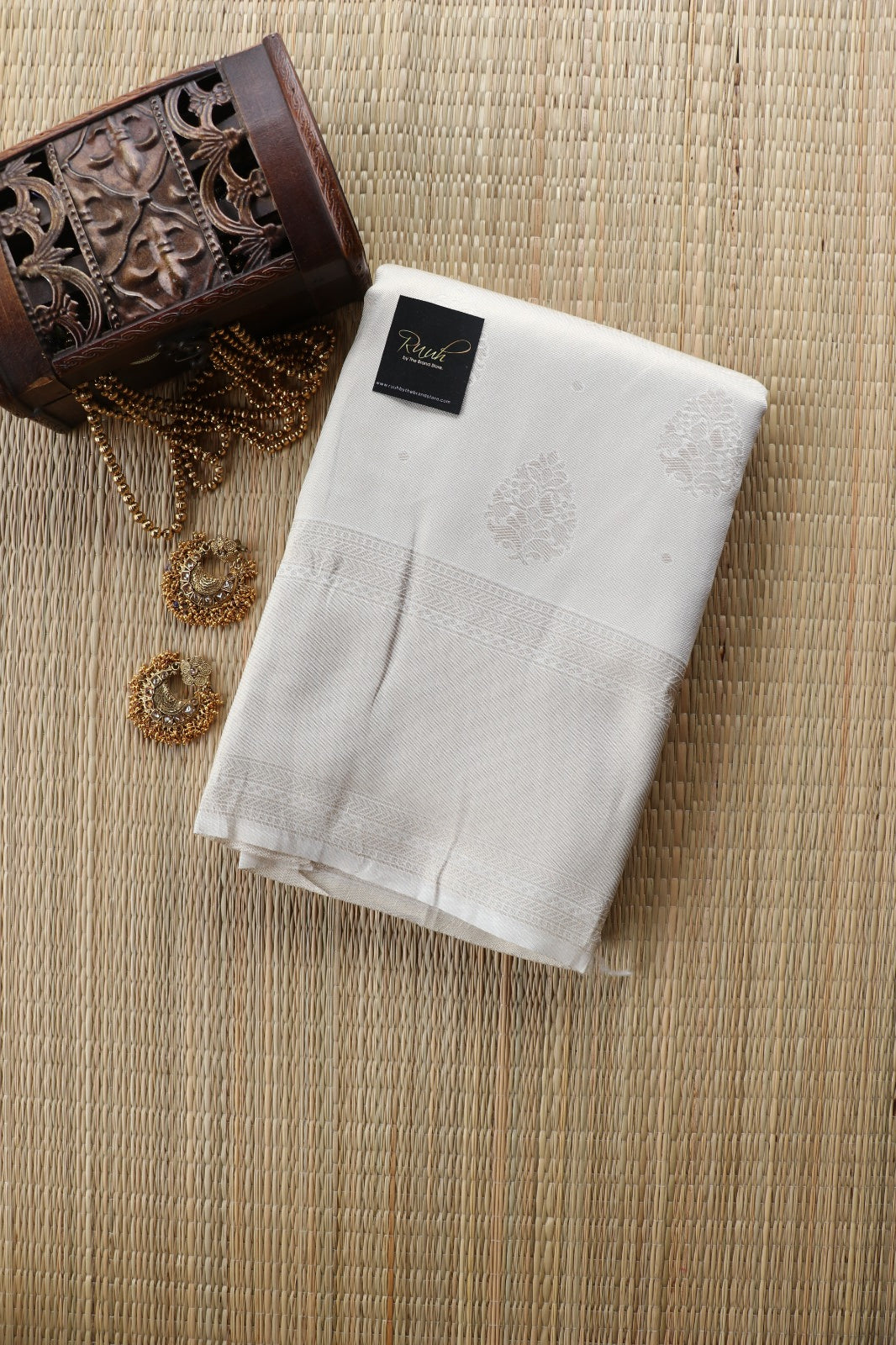 SEMI SILK SAREE WITH WOVEN BUTTAS