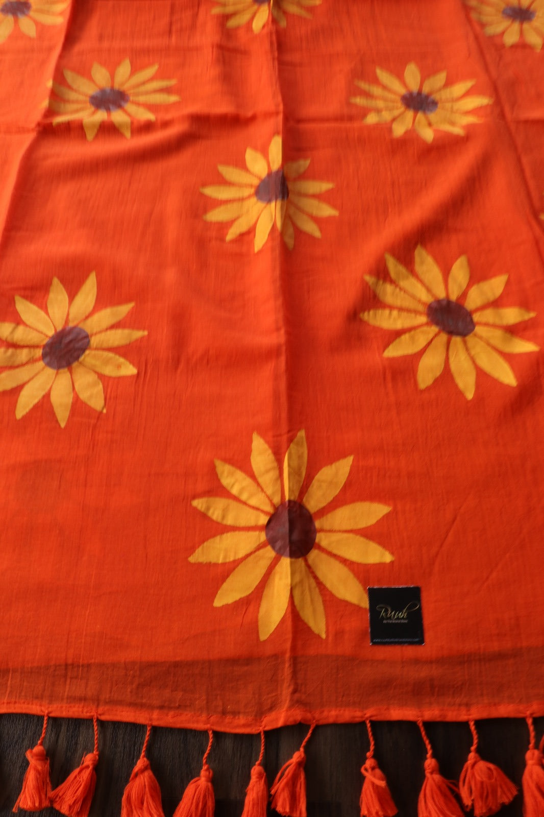 RUST ORANGE MULMUL SUNFLOWER HANDPAINTED SAREE