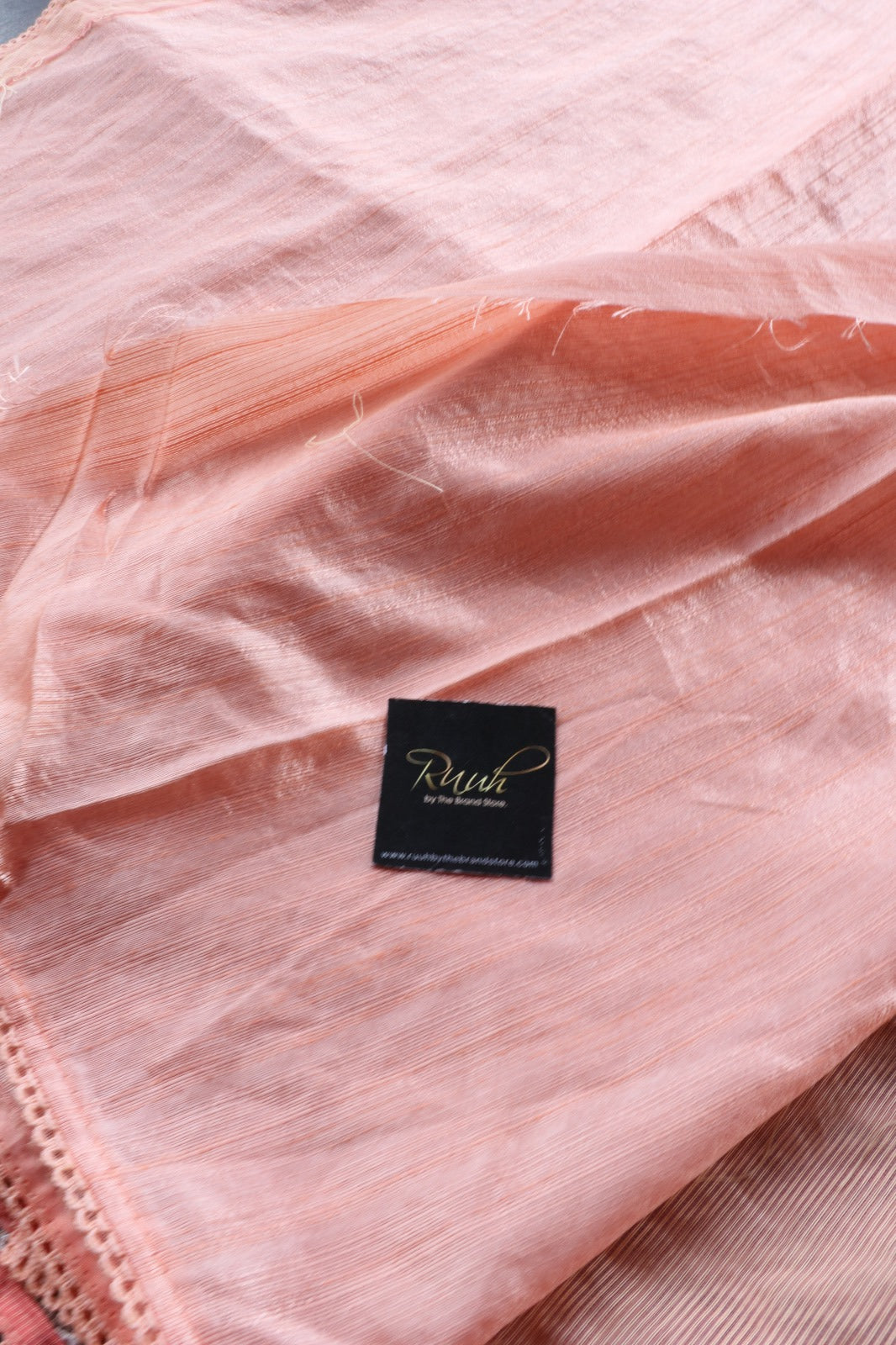 PEACH NET KOTA SAREE WITH FLORAL EMBROIDERY