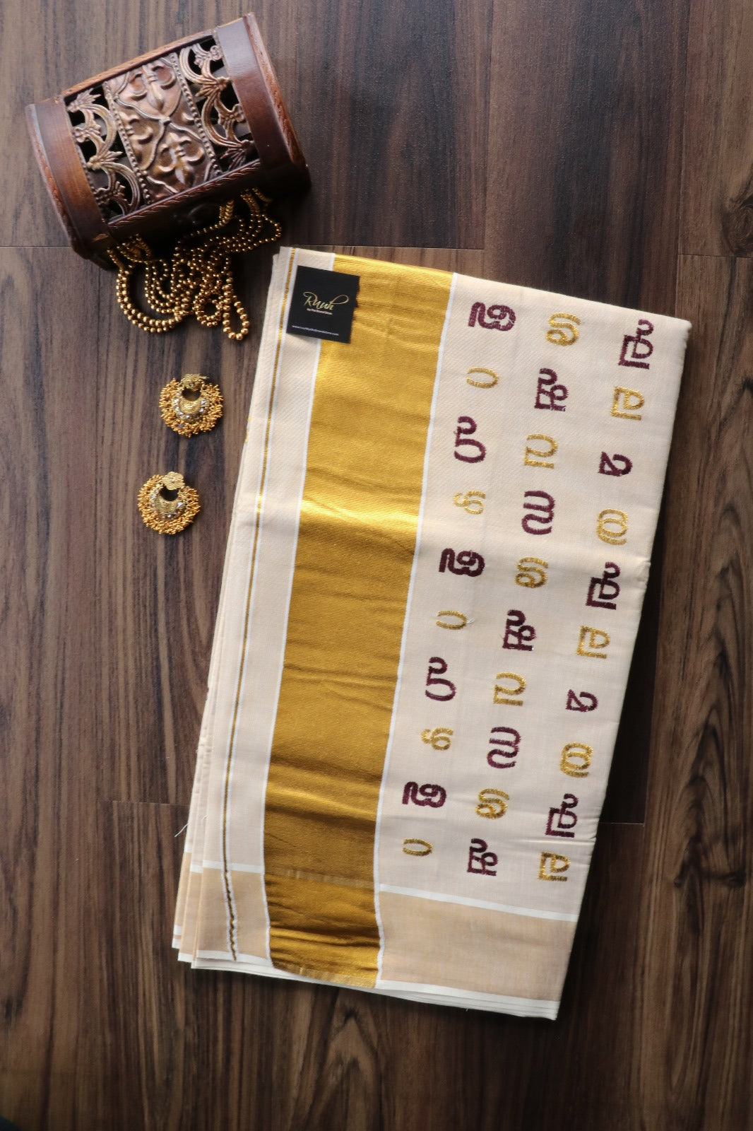 AKSHARAMALA ON KERALA TISSUE -WINE  & GOLD