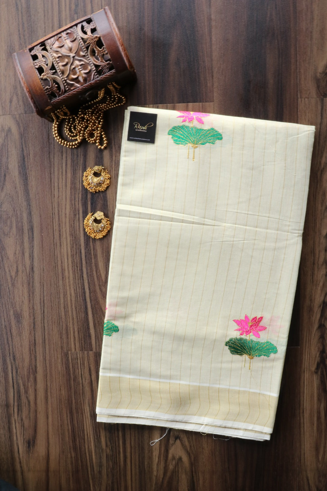 LOTUS EMBROIDERY ON KERALA TISSUE SAREE