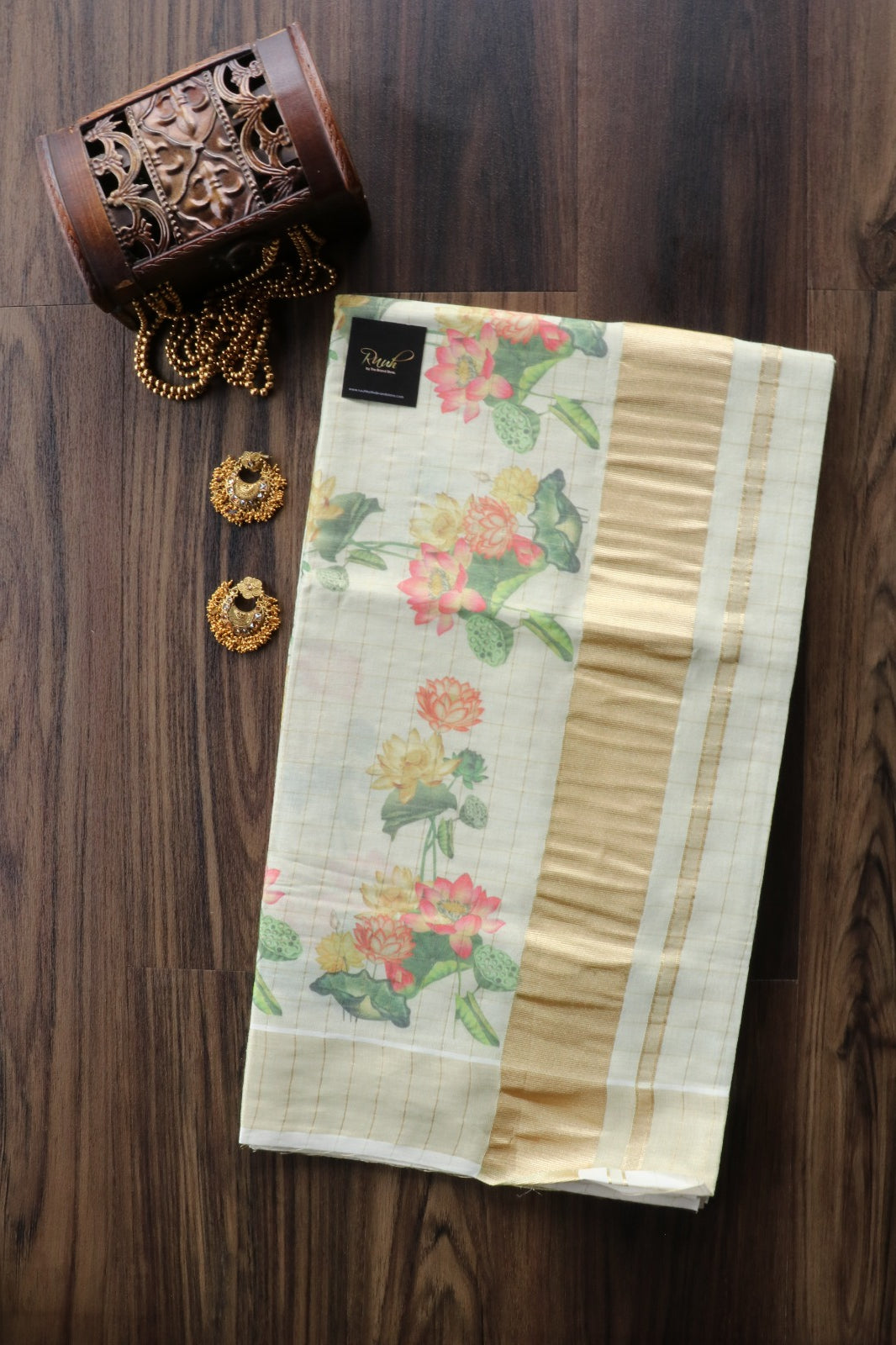 LOTUS PRINTED KERALA TISSUE CHECK SAREE