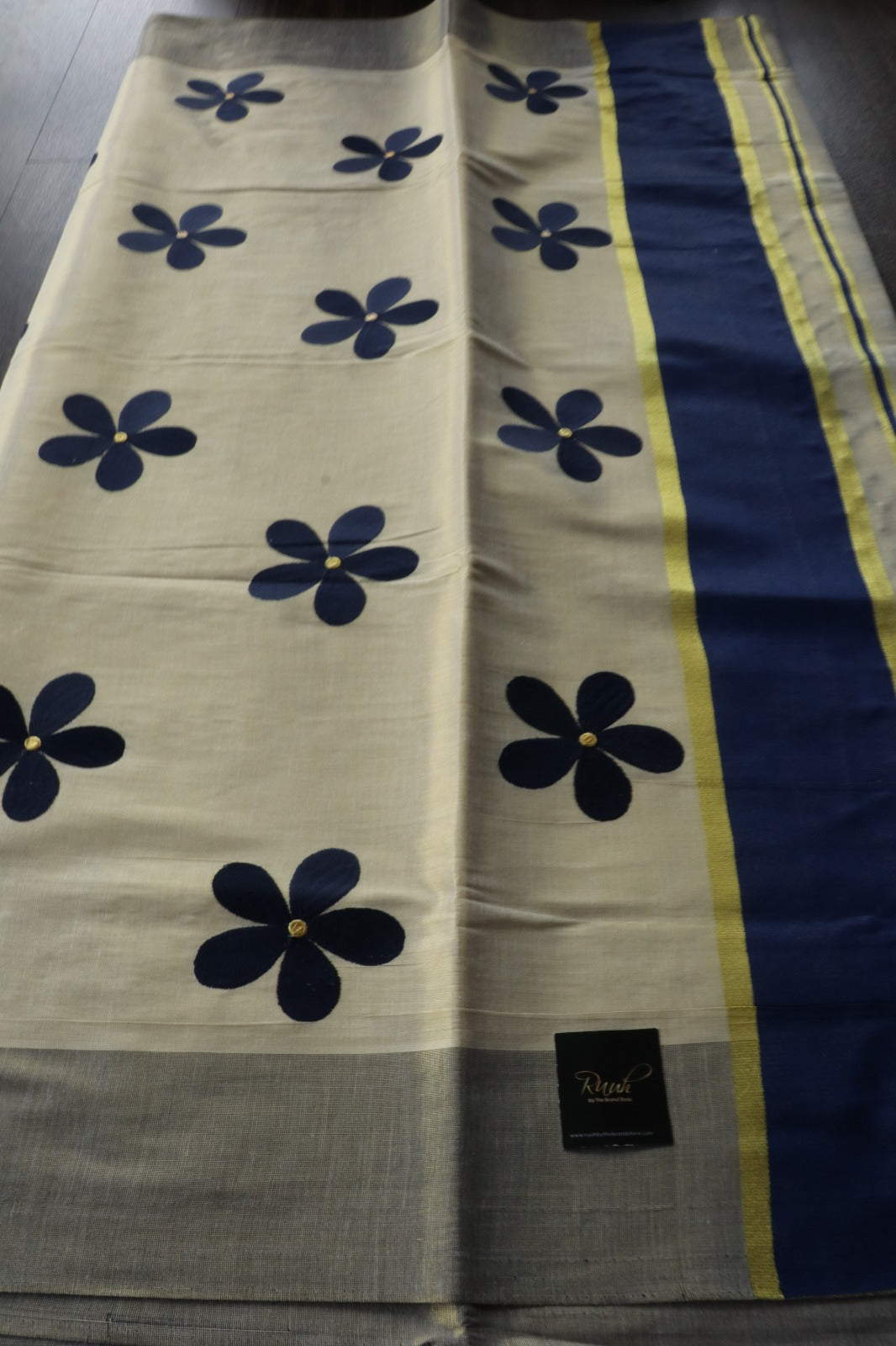 BLUE FLORAL EMBROIDERY ON KERALA TISSUE SAREE