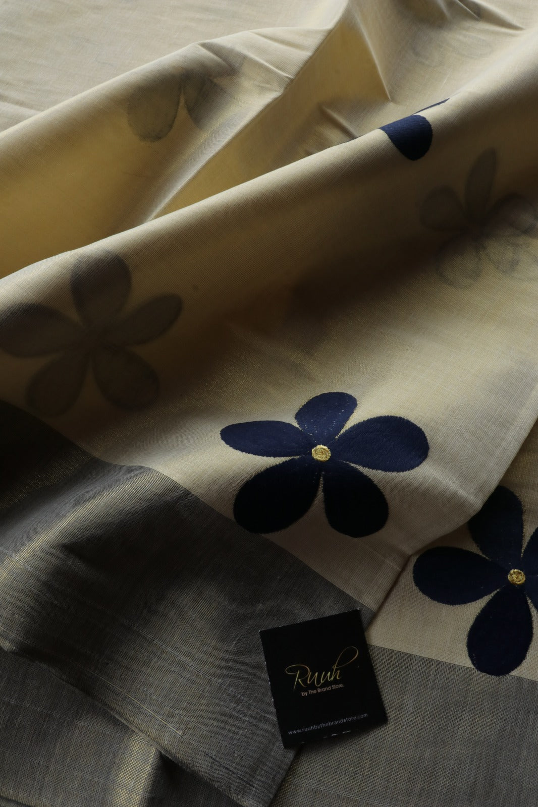 BLUE FLORAL EMBROIDERY ON KERALA TISSUE SAREE