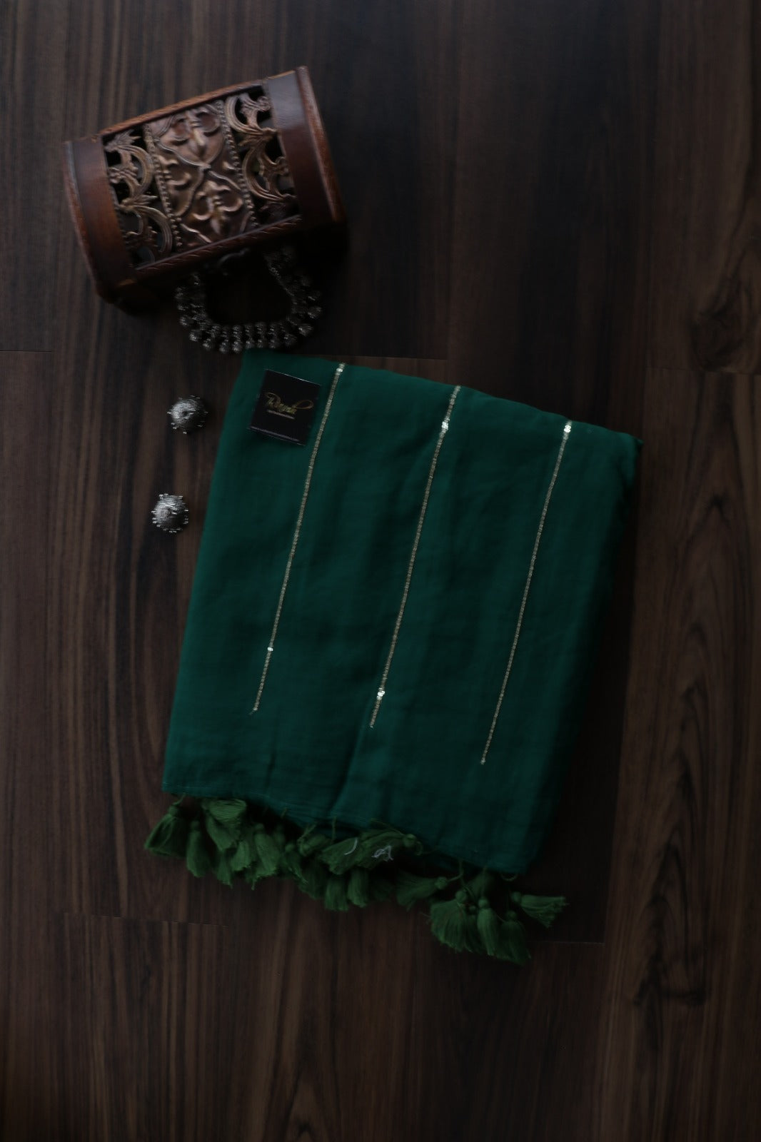 DARK GREEN MULMUL SEQUENCE SAREE