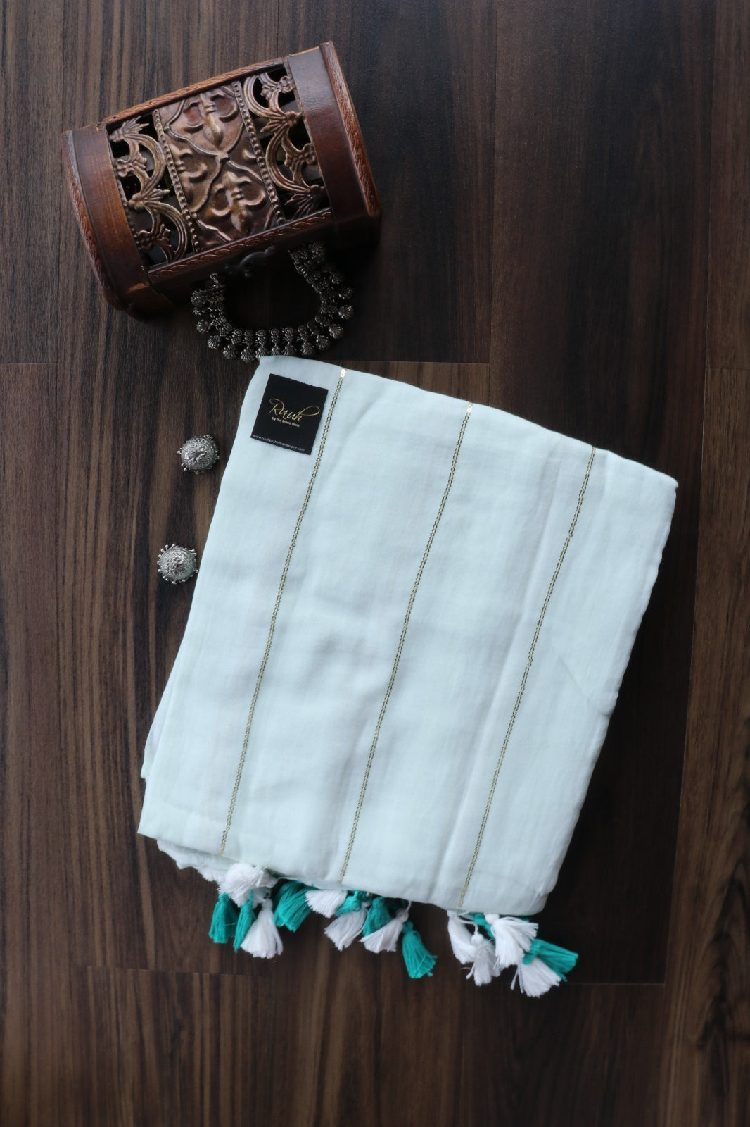 LIGHT PISTA MULMUL SEQUENCE SAREE