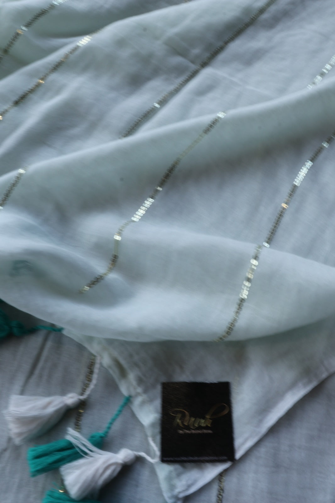 LIGHT PISTA MULMUL SEQUENCE SAREE