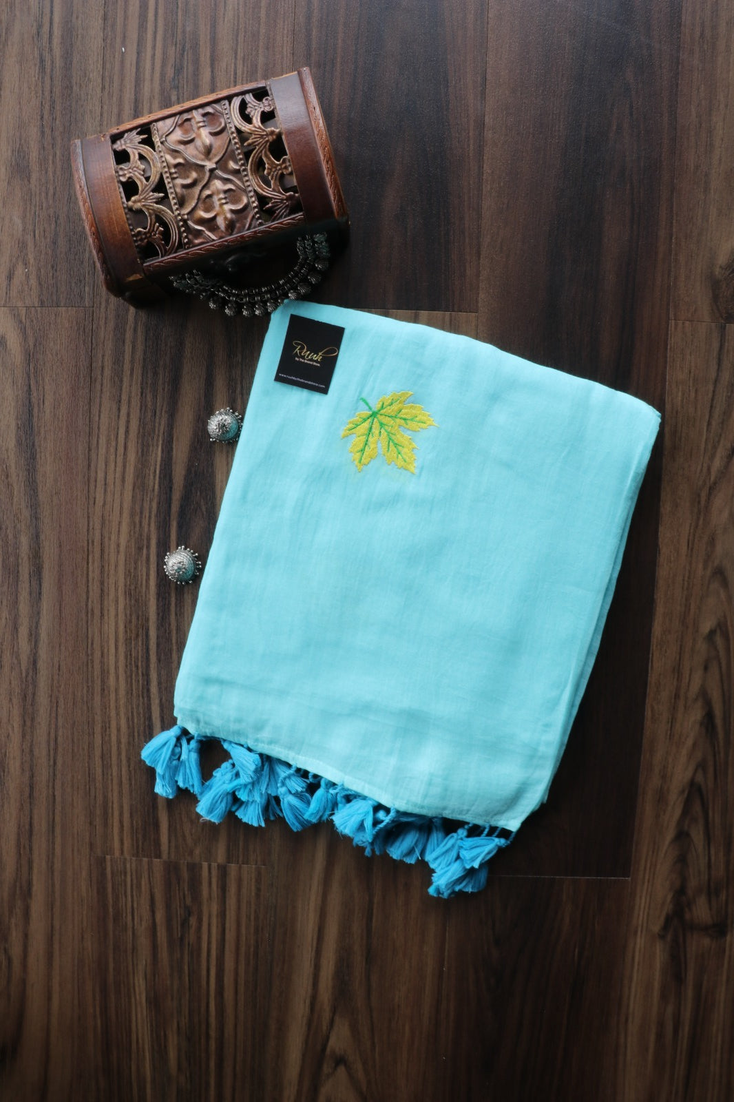 LIGHT BLUE MULMUL SAREE WITH MAPLE LEAF EMBROIDERY