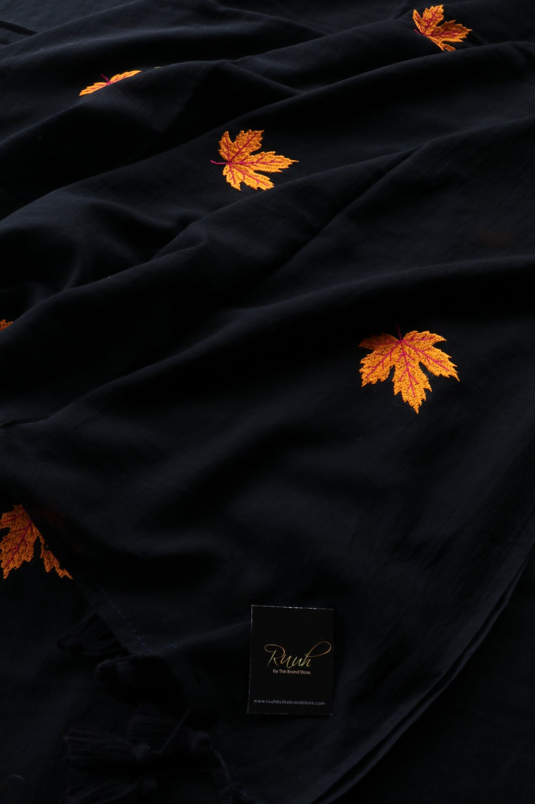 BLACK MULMUL SAREE WITH MAPLE LEAF EMBROIDERY
