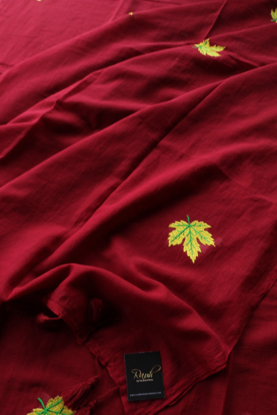 MAROON MULMUL SAREE WITH MAPLE LEAF EMBROIDERY