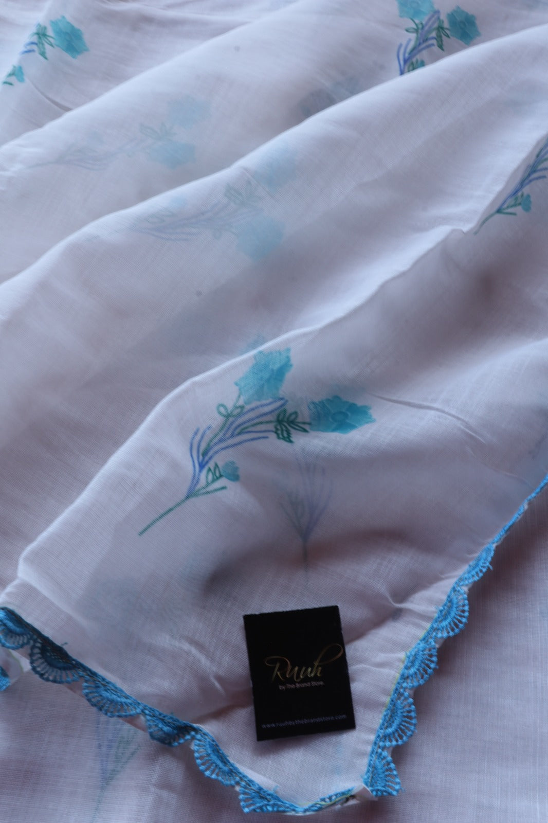 BLUE FLORAL PRINT  ON WHITE SEMI LINEN