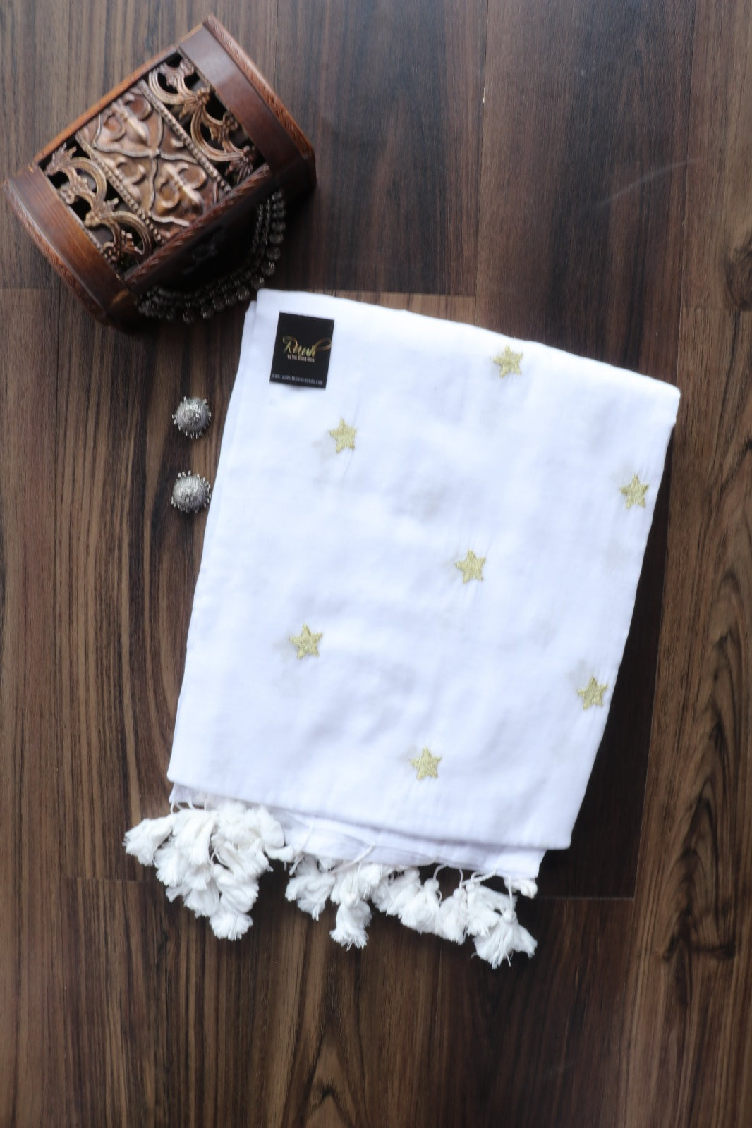 WHITE MULMUL SAREE WITH STAR EMBROIDERY