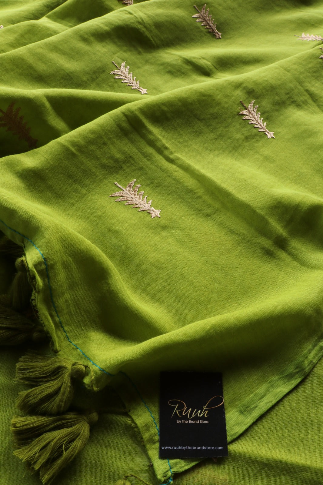 GREEN MULMUL SAREE WITH PINE TREE EMBROIDERY